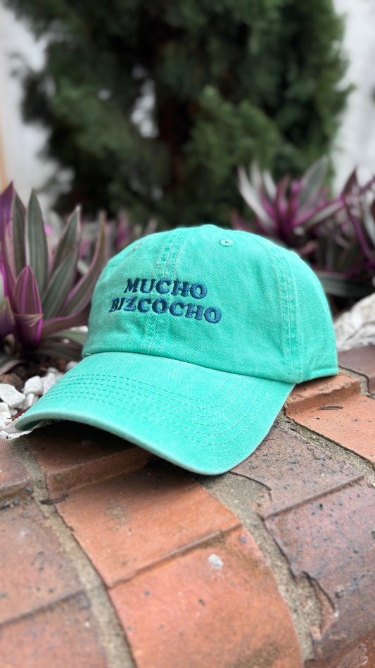 "Mucho Bizcocho" Cap – Colombian Slang Hat